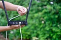 Image of a hand of a man with a white cable internet And hold modem router. Royalty Free Stock Photo