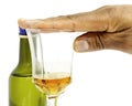 Stop drinking New Year`s resolution with hand over glass