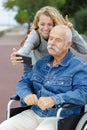 image handicapped dad taking selfie with daughter Royalty Free Stock Photo