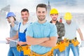 Image of happy carpenter standing arms crossed Royalty Free Stock Photo