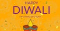 Image of happy diwali festival of light over neon pumpkin on brown background Royalty Free Stock Photo