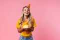 Cheery birthday woman holding cake with candle