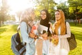 Image of happy friends muslim sisters women walking outdoors Royalty Free Stock Photo