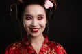 Image of happy geisha woman in traditional japanese kimono smiling Royalty Free Stock Photo