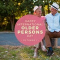 Image of happy international older persons day over happy caucasian senior couple