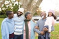 Image of happy multi generation african american family having fun outdoors in autumn Royalty Free Stock Photo