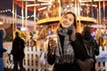 Image of happy woman with glass and phone in hands in evening for walk Royalty Free Stock Photo