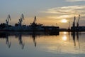 Harbor cranes at sunset Royalty Free Stock Photo