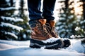 Macro Photography of Hiker\'s Boots Mid-Stride - Sinking into Pristine Deep Snow, Flurries Sticking to Soles Royalty Free Stock Photo