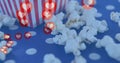 Image of heart icons over box of popcorn Royalty Free Stock Photo