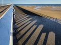 Image of hervey bay pier with low shadow at low tide