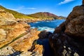 Hidden tide pool nook on west coastline with cliffs and ocean