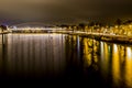 Image of the High bridge over the river Maas with reflections of yellow lights Royalty Free Stock Photo