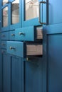 Blue kitchen fronts with clean lines and hardware. Blue cabinetry. Royalty Free Stock Photo