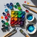 The image highlights the tools typically used in watercolor painting Royalty Free Stock Photo