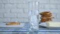 Image with Ice Cubes in a Empty Glass for Water from the Table Royalty Free Stock Photo