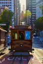 Iconic San Francisco Trolley driving downtown towards Oakland Bay Bridge