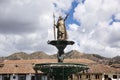 Image of Inka sculpture in Cusco main square. Peruvian city in the Andes. Golden sculpture. Royalty Free Stock Photo