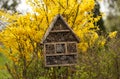 Image of Insect house - hotel in a spring garden Royalty Free Stock Photo