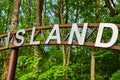 Island entrance board, entry to forest, giant sign, silver letters, asset