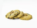 An image isolated close-up pile of three cookies is a biscuit mix chocolate chip and nut for a baked breakfast on white background Royalty Free Stock Photo