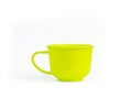 An image isolated a single ceramic teacup green color for drink on white background with clipping path