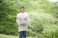 Image of Japanese middle-aged woman and gardening,