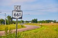 JCT 661 sign next to highway in summer with blue sky and thin clouds Royalty Free Stock Photo