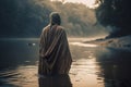 Image of Jesus Christ dressed in tunic standing in water for baptism. Royalty Free Stock Photo