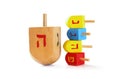 wooden colorful dreidels (spinning top) for hanukkah jewish holiday isolated on white Royalty Free Stock Photo