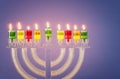 image of jewish holiday Hanukkah background with crystal menorah (traditional candelabra) Royalty Free Stock Photo