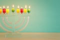 image of jewish holiday Hanukkah background with crystal menorah & x28;traditional candelabra& x29; Royalty Free Stock Photo