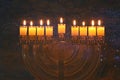 image of jewish holiday Hanukkah background with crystal menorah (traditional candelabra) Royalty Free Stock Photo