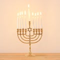 image of jewish holiday Hanukkah background with menorah & x28;traditional candelabra& x29; and candles. Royalty Free Stock Photo