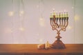 Image of jewish holiday Hanukkah background with traditional spinnig top, menorah & x28;traditional candelabra& x29; Royalty Free Stock Photo