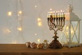 image of jewish holiday Hanukkah background with traditional spinnig top, menorah & x28;traditional candelabra& x29;