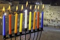 Image of jewish holiday Hanukkah with menorah (traditional candelabra) and burning candles on Jerusalem background. Royalty Free Stock Photo