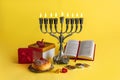 Jewish holiday Hanukkah with menorah, donuts and wooden dreidels, doughnut Royalty Free Stock Photo