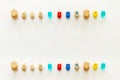 Image of jewish holiday Hanukkah with wooden dreidels colection & x28;spinning top& x29; over white background. Royalty Free Stock Photo