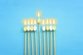 Image of jewish holiday Hanukkah with wooden dreidels collection (spinning top) as menorah Royalty Free Stock Photo