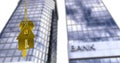 Image of key in house keychain over bank text on modern buildings against sky
