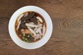 Image of Kway chap ,the Asian local and popular food, consist of a noodle soup made with dark soy sauce, pork, pork blood; Royalty Free Stock Photo