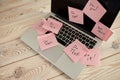 Image of laptop full of sticky notes reminders on screen. Work overload concept image. Coworking or working at home concept image Royalty Free Stock Photo