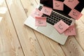 Image of laptop full of sticky notes reminders on screen. Work overload concept image. Coworking or working at home concept image Royalty Free Stock Photo