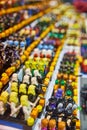 A large collection of LEGO figurines in neat rows like an army