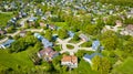 Large overlook of suburban neighborhood homes and houses aerial Royalty Free Stock Photo