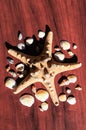 Image with a large sea star surrounded by many shells. Starfish on wood background. Elements of sea and ocean. Vacation memories Royalty Free Stock Photo