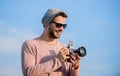 An image is Life. sexy man touristic reporter. photographer in glasses. travel with camera. male fashion style. looking Royalty Free Stock Photo