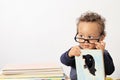 Little boy reading book with glasses Royalty Free Stock Photo