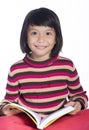 Image of a little girl smile holding a book on white background Royalty Free Stock Photo